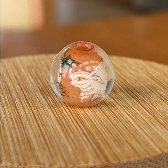 Reverse painted glass, bead, half inch diameter with white bunny in the garden - Picture 3 of 13